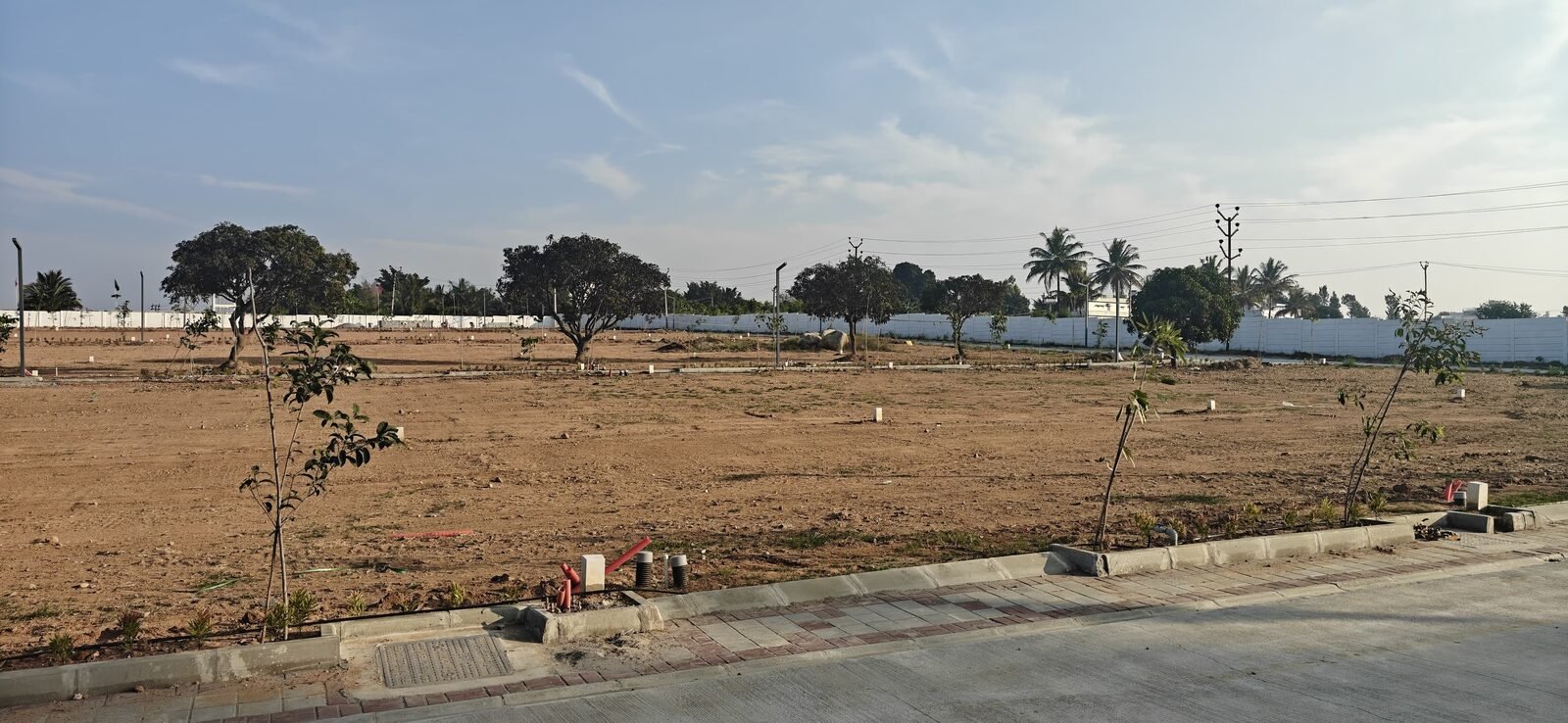 Vistara Green City - Wide concrete internal road